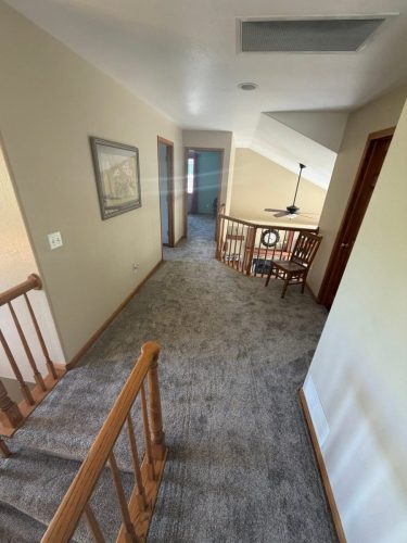 Fort Collins Carpet Installation with Wrapped Stairs – Elevated III Rodeo